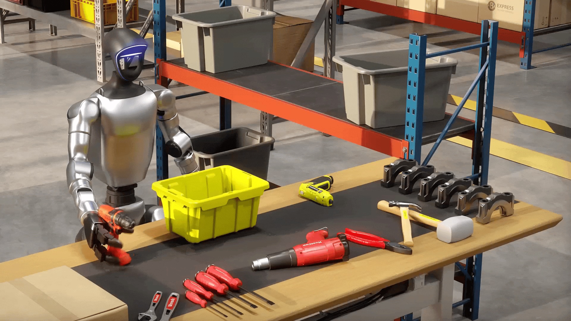 Humanoid robot handling a tool beside storage racks and a workbench