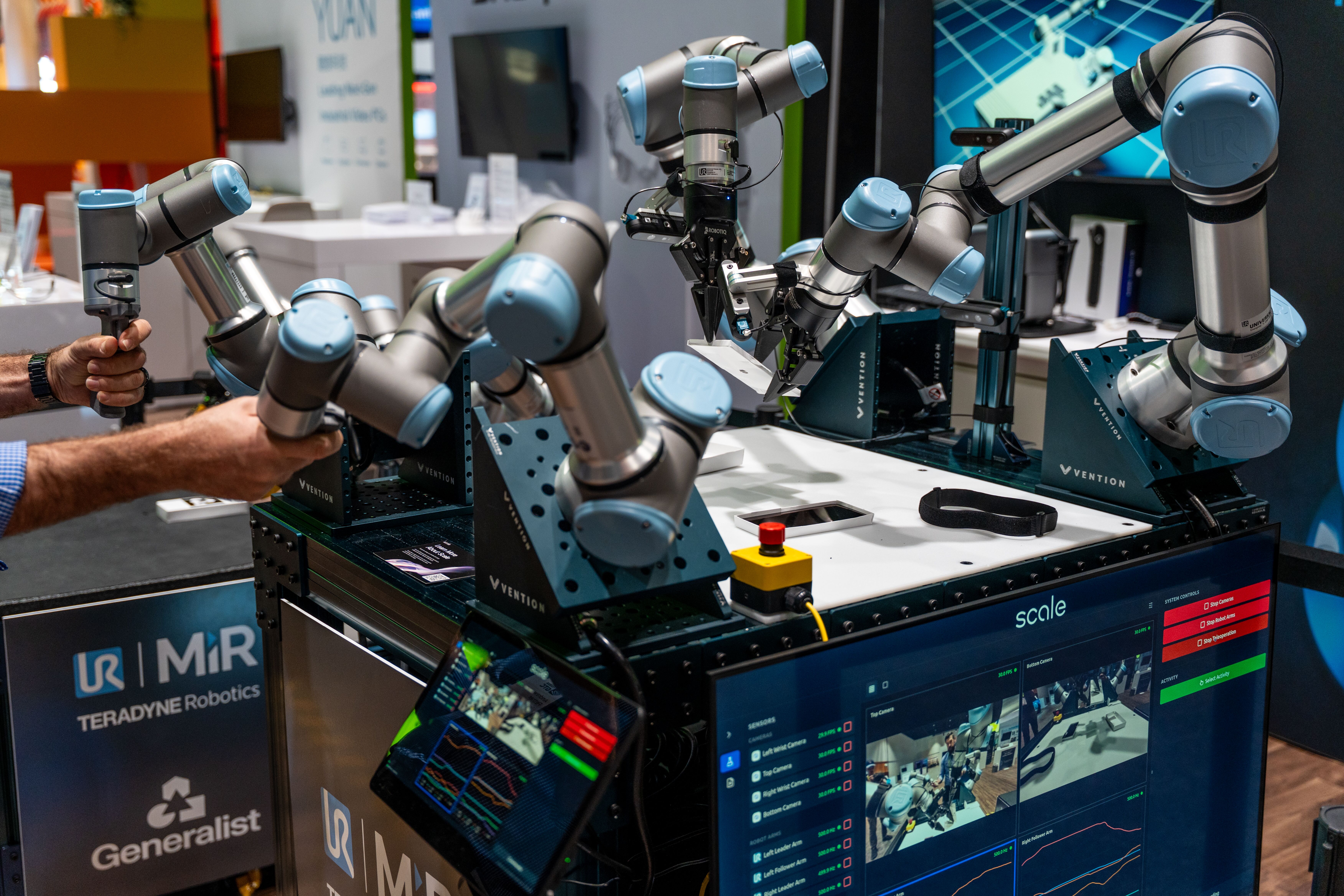 Universal Robots collaborative arms operating in an AI training and monitoring demonstration cell